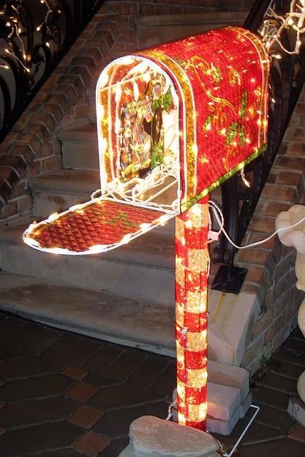 This Christmas mailbox will light up your whole front yard! It's bright red and white Christmas lights make a big statement