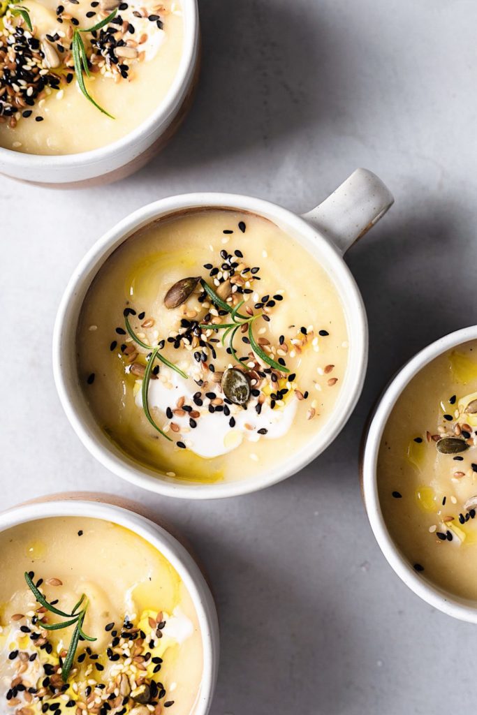 15 Creamy Vegan Soup Recipes; This vegan roasted garlic and parsnip soup is perfect for the Fall season
