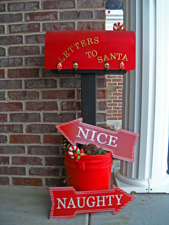 This Christmas mailbox is all ready to deliver letters to santa, with cute Naughty and Nice signs