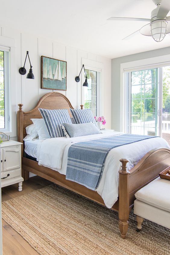 This cottage style master bedroom is cozy and inviting, it feels like you're right on the beach!