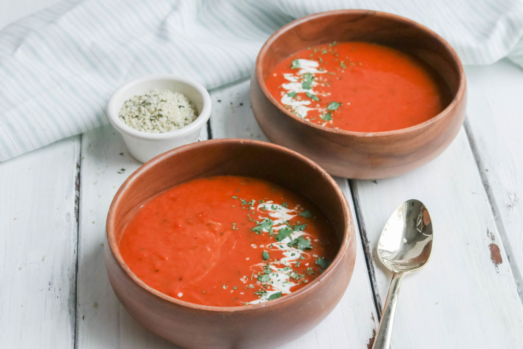 This fire roasted sweet potato and tomato soup is hearty and creamy