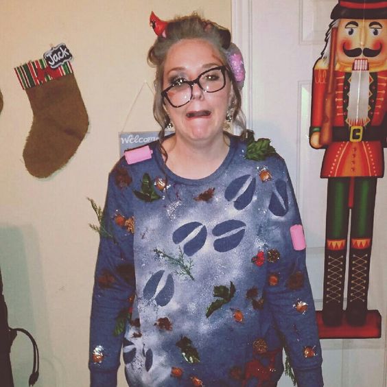 This creative Christmas sweater brings to life the classic Christmas song, Grandma Got Run Over by a Reindeer