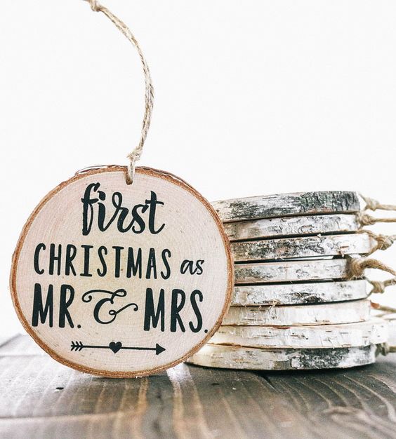 I love these homemade Mr. and Mrs wood slice ornaments! This is a great way to add a personal touch to your Christmas tree decor