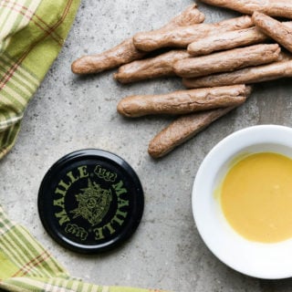 Gluten Free and Vegan Pretzel Sticks with Maple Mustard Dip; delicious appetizer idea for the holiday season. Easy finger food everyone will love! #glutenfreepretzels #maillemustard #dijonmustard #veganpretzels