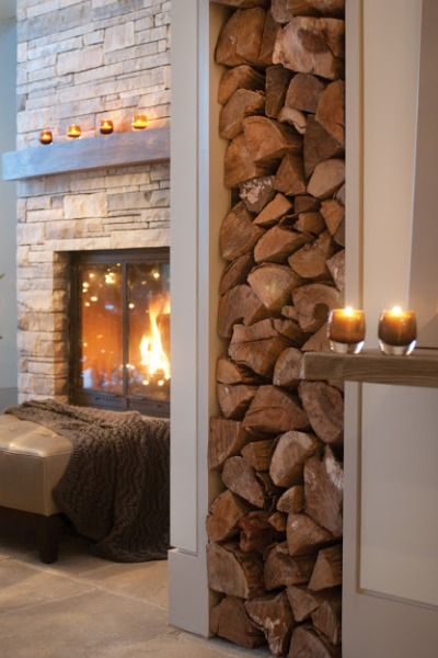 Stylish Ways To Store Wood in Your Home; cute and high style ways to hide or display wood in your home when you have a fire place or a wood burning stove. Bring on the heat and adorable piles of wood! #woodstove #fireplace #storingwood #woodpiles