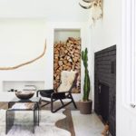 Stylish Ways To Store Wood in Your Home; cute and high style ways to hide or display wood in your home when you have a fire place or a wood burning stove. Bring on the heat and adorable piles of wood! #woodstove #fireplace #storingwood #woodpiles