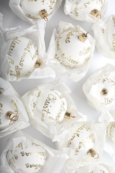 I love these white and gold Christmas ornaments with sparkling gold script.