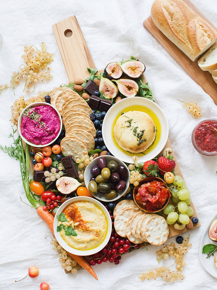 Vegan Charcuterie Board Ideas; options for a appetizer platter to please everyone in the family! Stay healthy this holiday season with this spread of goodies #charcuterieboard #veganappetizers #cheesefree #vegetarianappetizers || Nikkisplate.com