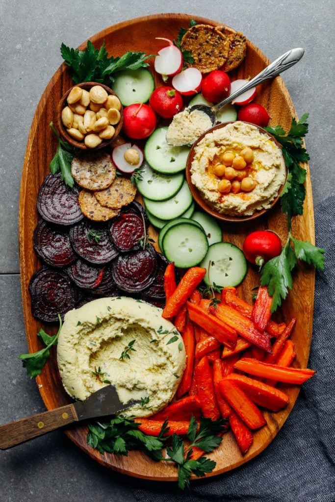 this vegan charcuterie board has vegan cheese, delicious veggies nuts for a complete spread