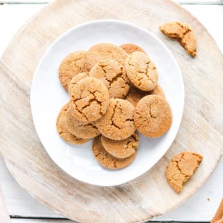 These healthier ginger molasses cookies are crunchy on the outside yet chewy on the inside. Using oat and almond flour, and non processed sugars, these cookies will leave you feeling guilt freeThese healthier ginger molasses cookies are crunchy on the outside yet chewy on the inside. Using oat and almond flour, and non processed sugars, these cookies will leave you feeling guilt free! #gingermolassescookies #healthy || Nikki's Plate