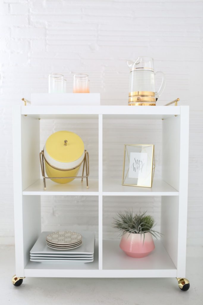 This fabulous bar cart was created from an IKEA Kallax storage unit.