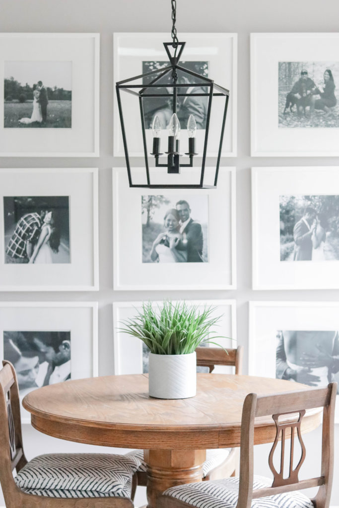 Creating our large photo gallery wall was even easier with a few simple tips and tricks to hang pictures perfectly the first time.