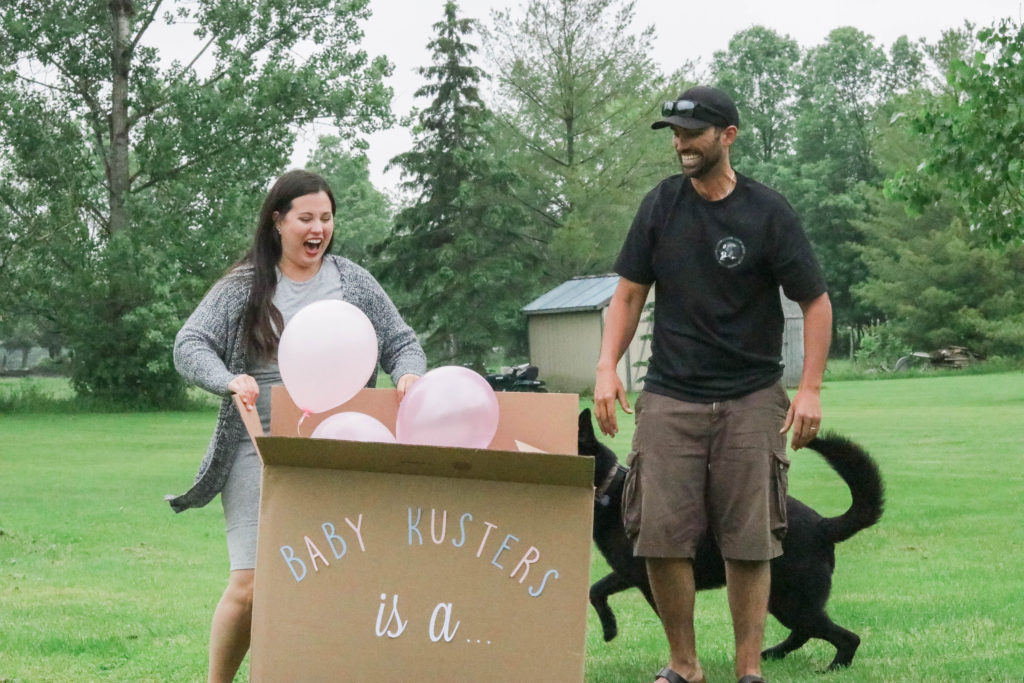 Gender Reveal Party - box revealing gender with balloons 