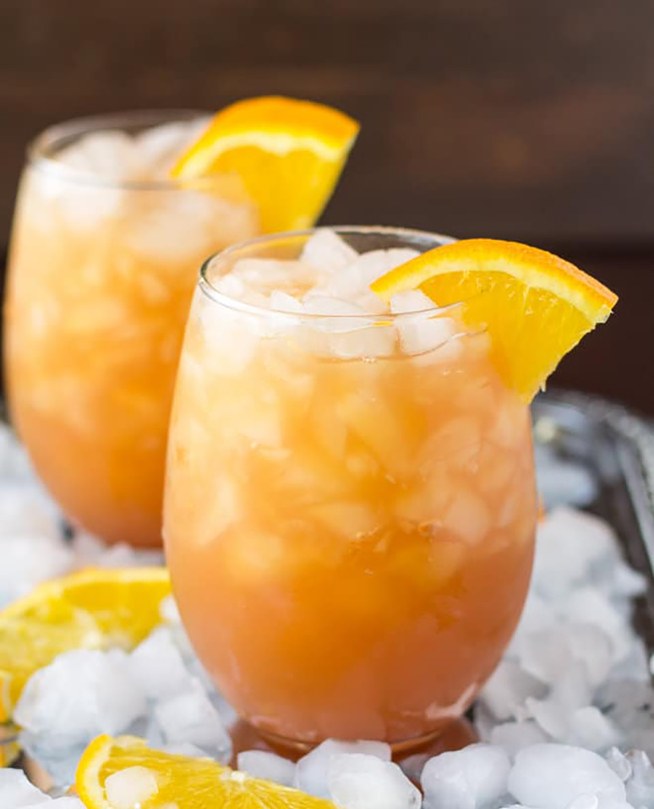9 Fun Non-Alcoholic Mocktails - this orange, cranberry, and apple mocktail is a perfect combination of summer flavors.