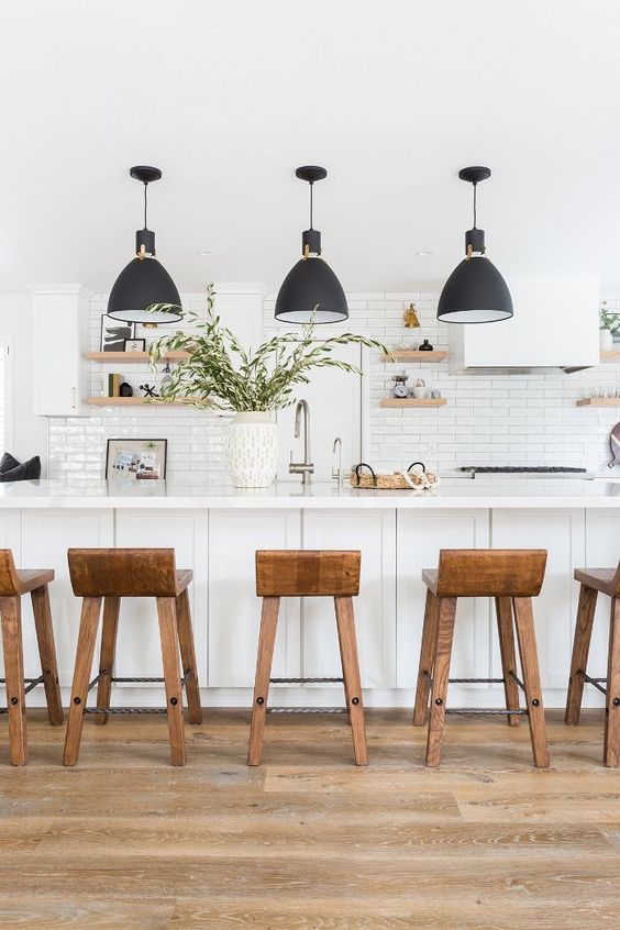 White Kitchen Designs You Haven't Seen Yet! Beautiful white kitchen inspiration for your remodel. Marble Countertop, wood bar stools, island light, island, bright white #whitekitchen #modern