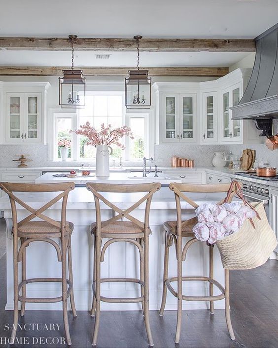 White Kitchen Designs You Haven't Seen Yet! Beautiful white kitchen inspiration for your remodel. Marble Countertop, wood bar stools, island  light, island, bright white #whitekitchen #modern