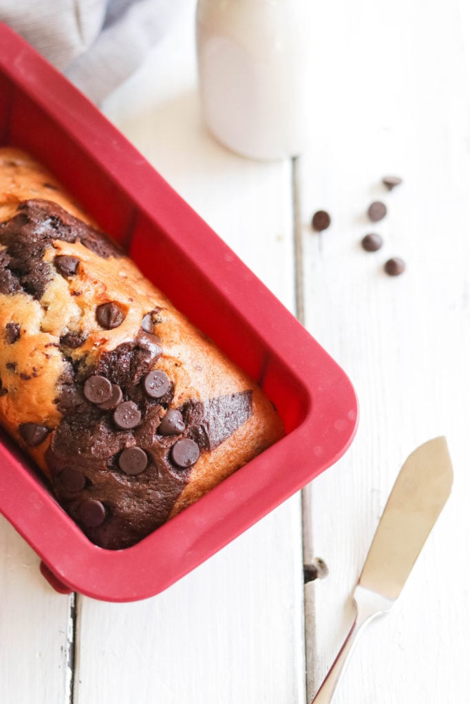 This delicious Vegan banana bread is swirled with rich chocolate and topped with chocolate chips