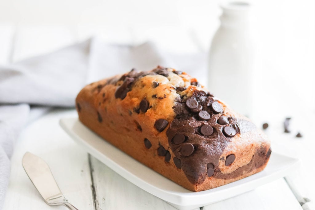 Make this delicious and EASY vegan chocolate banana bread! A classic banana bread recipe swirled with tasty chocolate.