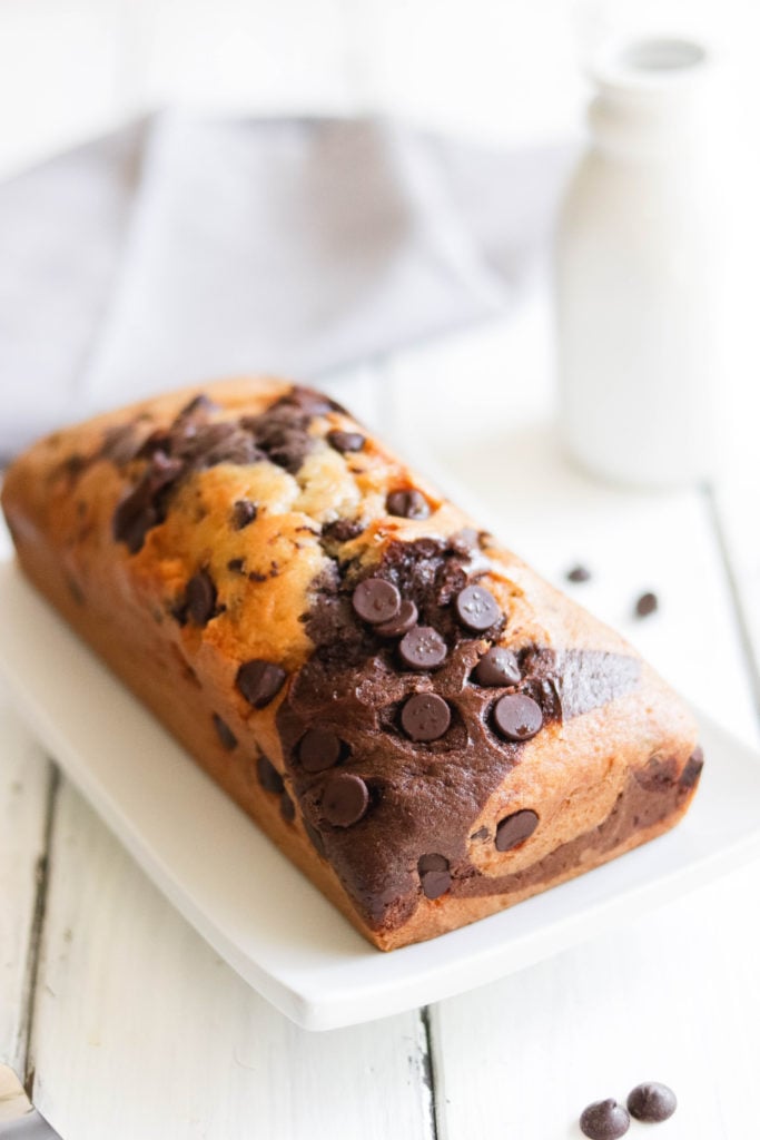This vegan chocolate banana bread is the perfect light, fluffy bread! With the perfect mix of chocolate swirl and chocolate chips, it's a sweet, healthy treat. 