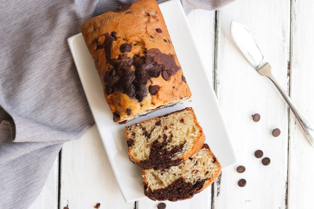 Vegan chocolate chip banana bread has a sweet swirl of chocolate throughout and has chocolate chips in every bite!