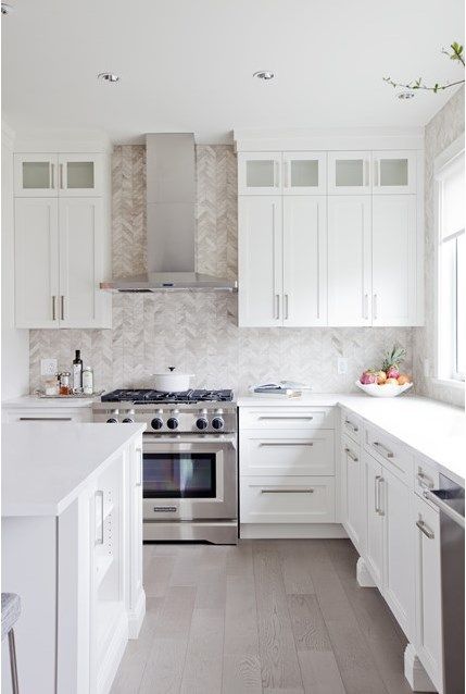 White Kitchen Designs You Haven't Seen Yet! Beautiful white kitchen inspiration for your remodel. Marble Countertop, black pendant light, island, bright white #whitekitchen #modern