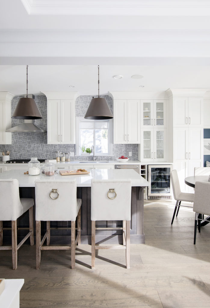 White Kitchen Designs You Haven't Seen Yet! Beautiful white kitchen inspiration for your remodel. Marble Countertop, black pendant light, island, bright white #whitekitchen #modern