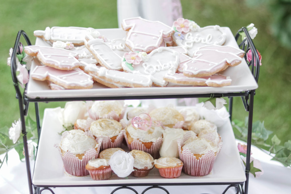 Sweet treats and desserts like cookies and cupcakes were included in the food buffet at our pretty in pink baby shower