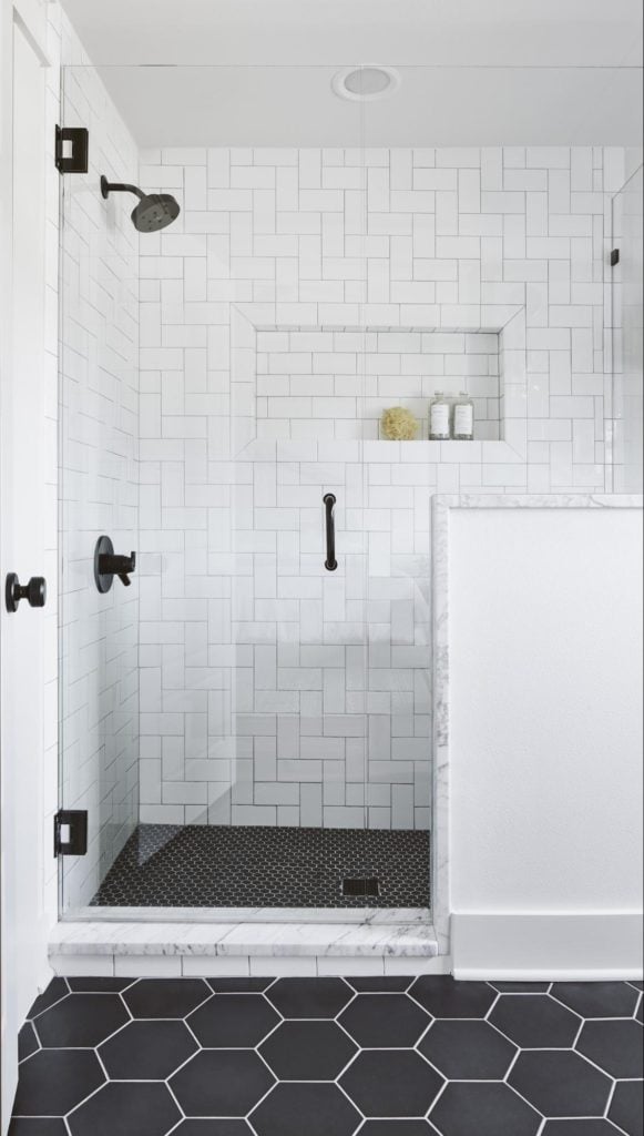 Best Bathrooms by Joanna Gaines; Fixer upper's top bathroom renovations by Joanna and chip Gaines! These rustic, country with hints of modern perfection bathrooms are everythin|| White Subway tile shower g #joannagaines #bathroom #bathrooms #renovations - Nikki's Plate
