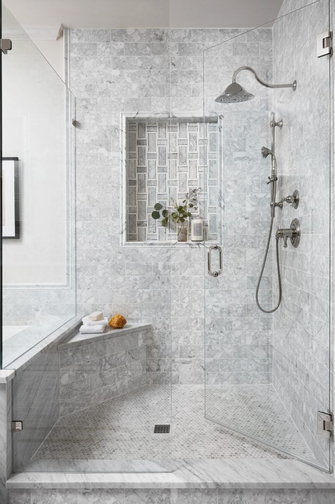 Best Bathrooms by Joanna Gaines; Fixer upper's top bathroom renovations by Joanna and chip Gaines! These rustic, country with hints of modern perfection bathrooms are everything #joannagaines #bathroom #bathrooms #renovations Grey Tile Shower - Nikki's Plate