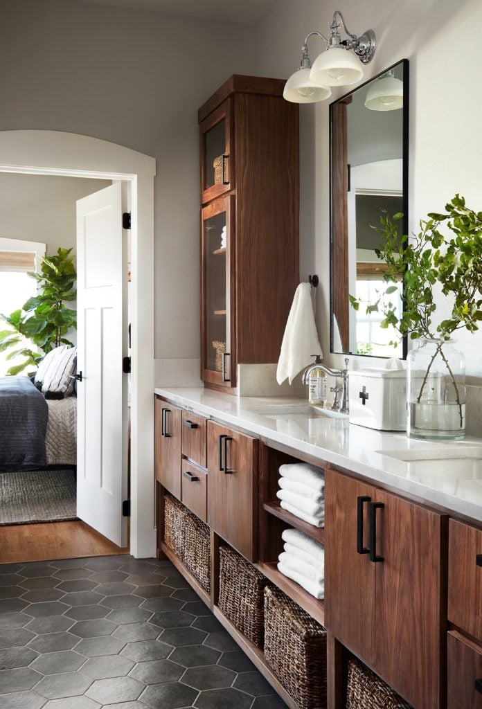 Best Bathrooms by Joanna Gaines; Fixer upper's top bathroom renovations by Joanna and chip Gaines! These rustic, country with hints of modern perfection bathrooms are everything #joannagaines #bathroom #bathrooms #renovations || Wood Vanity - Nikki's Plate