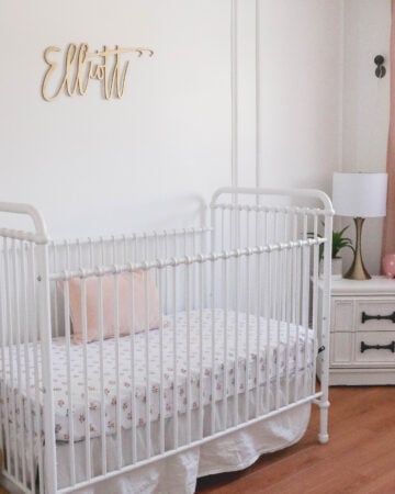 Baby Girl White and Pink Nursery Reveal; White vintage crib, name sign on wall, wainscotting