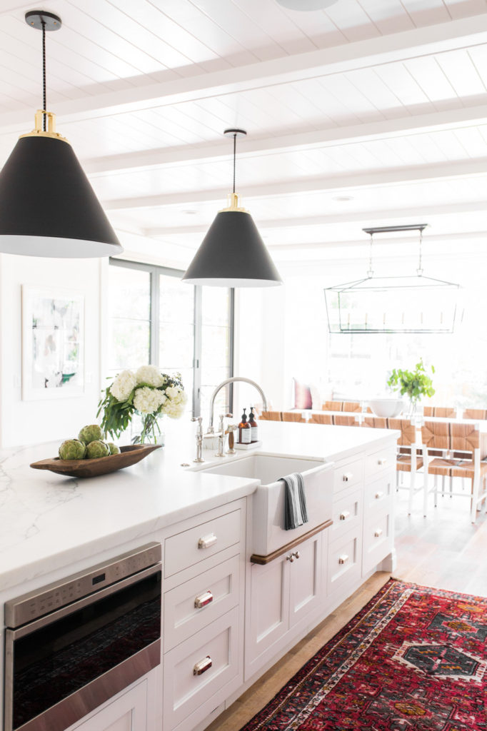 11 Best Kitchens by Studio McGee; This modern farmhouse kitchen is bright and open, with plenty of counter space to cook and entertain