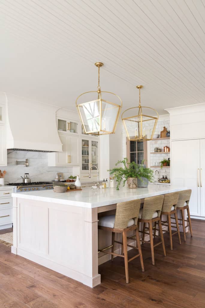 11 Best Kitchens by Studio McGee; The breakfast bar in this farmhouse style kitchen is a great place for family to gather