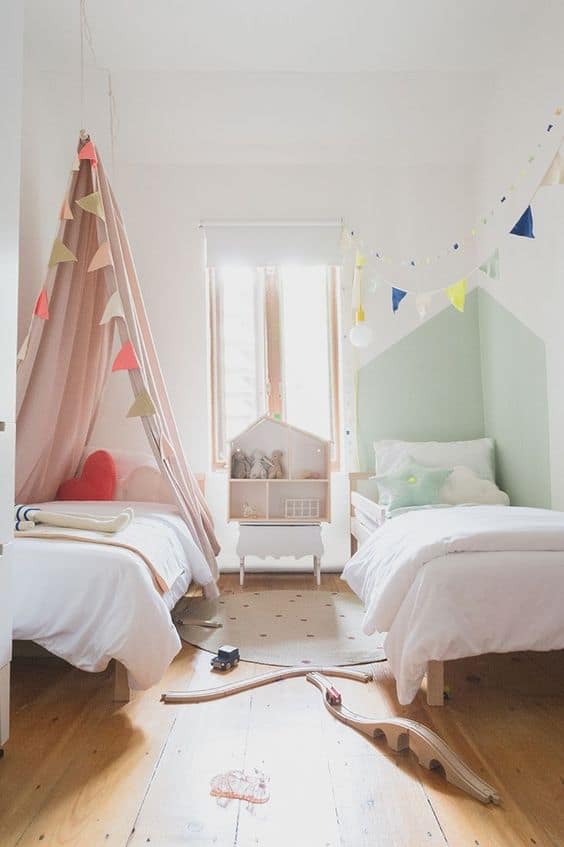 Here are 9 bedroom style tips for twins! Take a classic children's bedroom and off a stylish twin twist with these unique interior design ideas! #TwinBedrooms #TwinRooms || Nikki's Plate