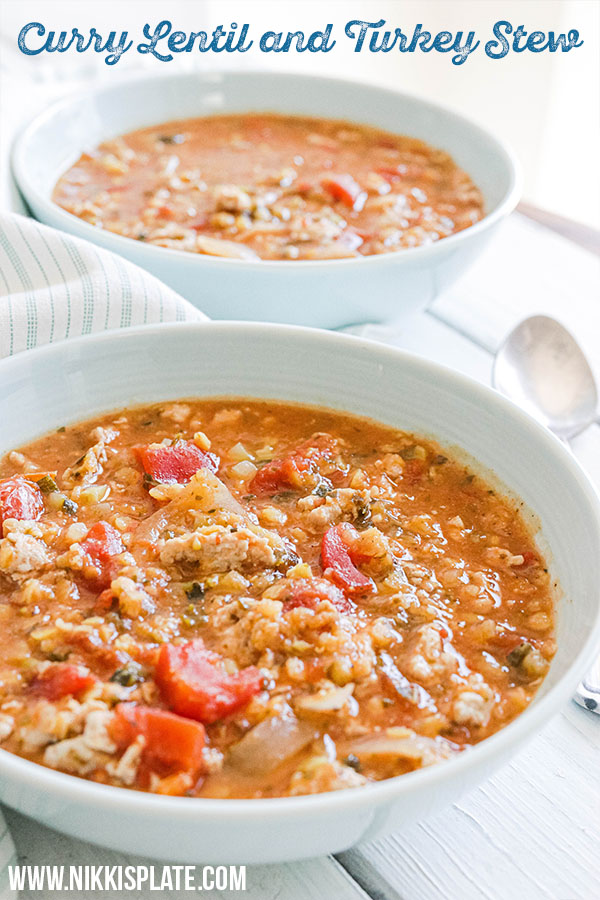 A curry lentil and turkey stew cooked in a slow cooker. Hearty and warm, protein packed, warm curried tomato based stew. Gluten Free and Dairy Free. || Nikki's Plate