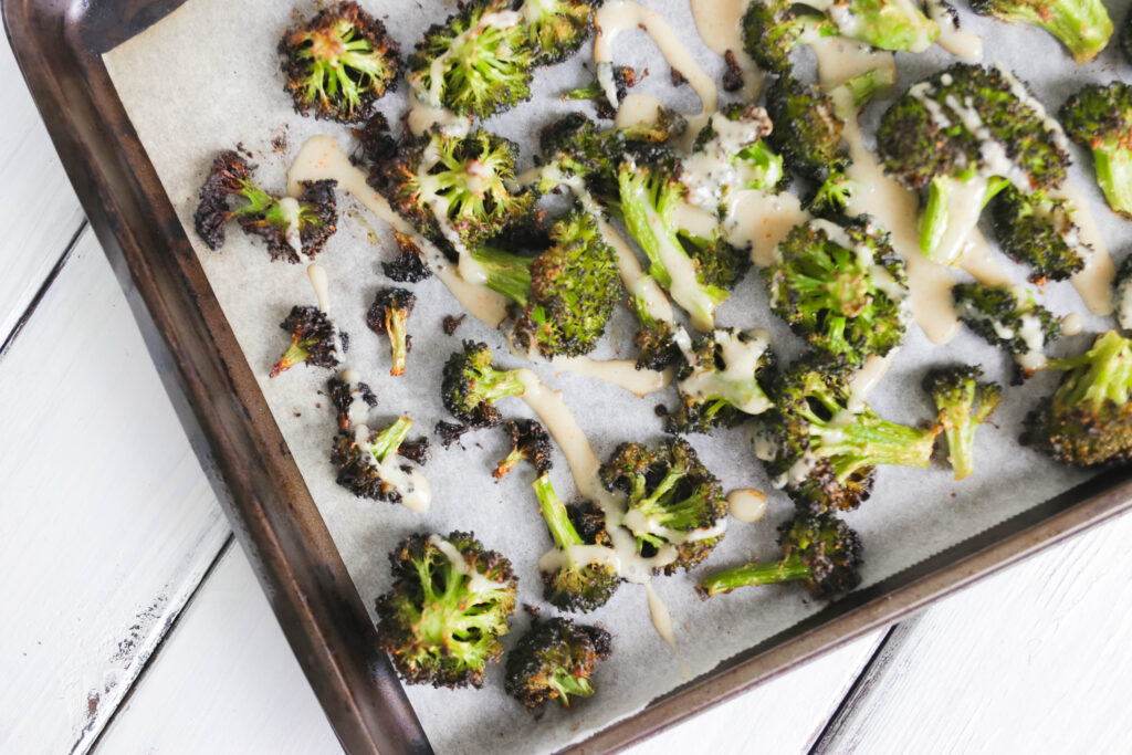 Crispy Broccoli with Vegan Cheese Sauce; dairy and gluten free side dish for your vegan dinner! A nut free cheese sauce that you will love smothered on your blackened broccoli!