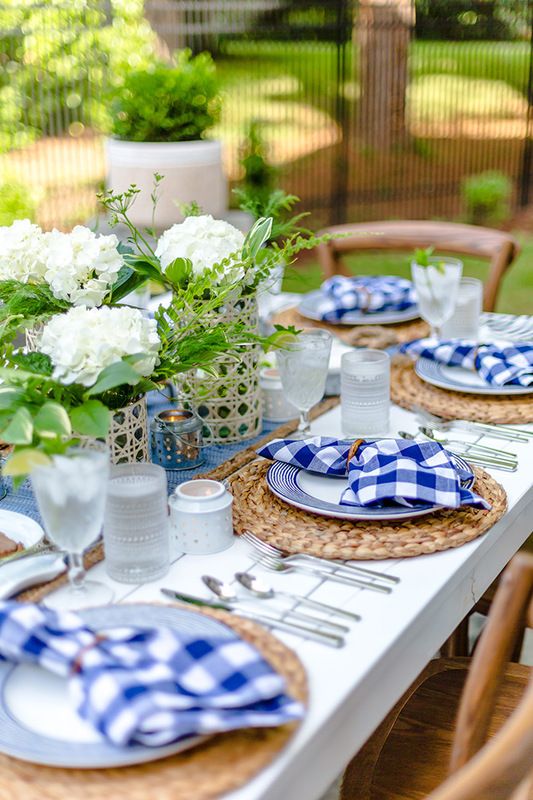 15 Deck Must Haves for Summer Entertaining; outdoor plates table setting, blue patio place settings