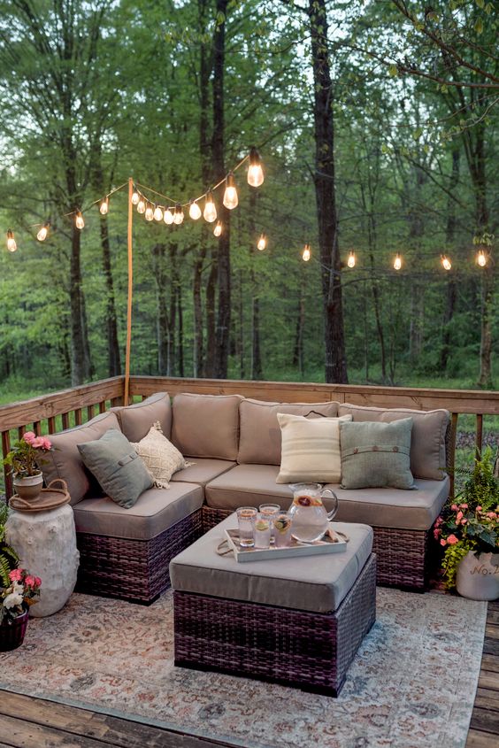 15 Deck Must Haves for Summer Entertaining; string outdoor lights, Edison lights, outdoor sectional, comfy seating