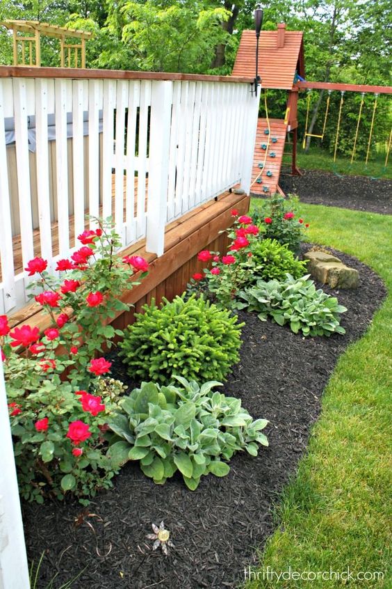 15 Deck Must Haves for Summer Entertaining; deck landscaping, deck garden, black mulch