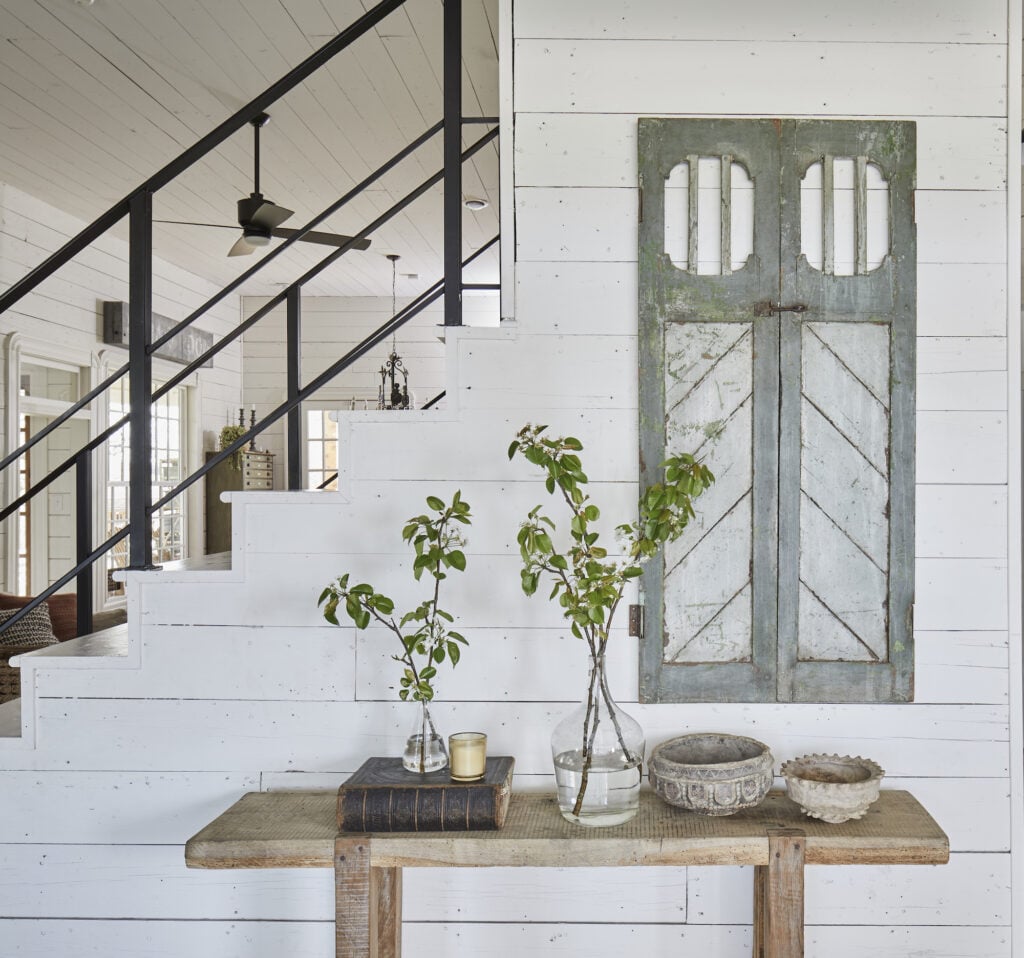 White farmhouse entrance way with white shiplap and antique furniture" Joanna Gaines Full Farmhouse Tour: Entire look inside Chip and Joanna Gaines's home