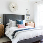 Studio McGee by Bedrooms: Austin Texas Project; dark grey bed; upholstered bed
