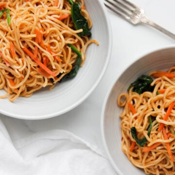 Easy Vegan Noodle Stir Fry is made with fresh vegetables, Tamari sauce, garlic, and spiced up with optional Sriracha sauce. This healthy dish can be made in less then 30 minutes!