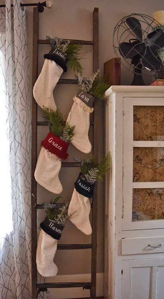 Where to Hang Stockings if You Don't Have a Fireplace; Christmas Decorations, stockings on a ladder, antique ladder
