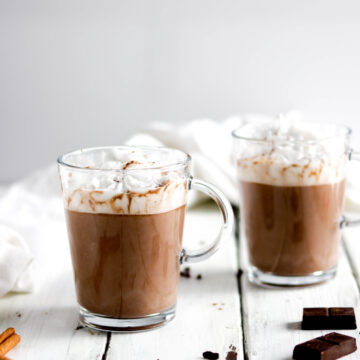 Dairy Free Peanut Butter Hot Chocolate; a delicious healthy hot chocolate recipe that is dairy-free and vegan friendly! Made with almond milk and real chocolate goodness! Sweetened with natural sugars from maple syrup! #hotchocolate #veganhotchocolate