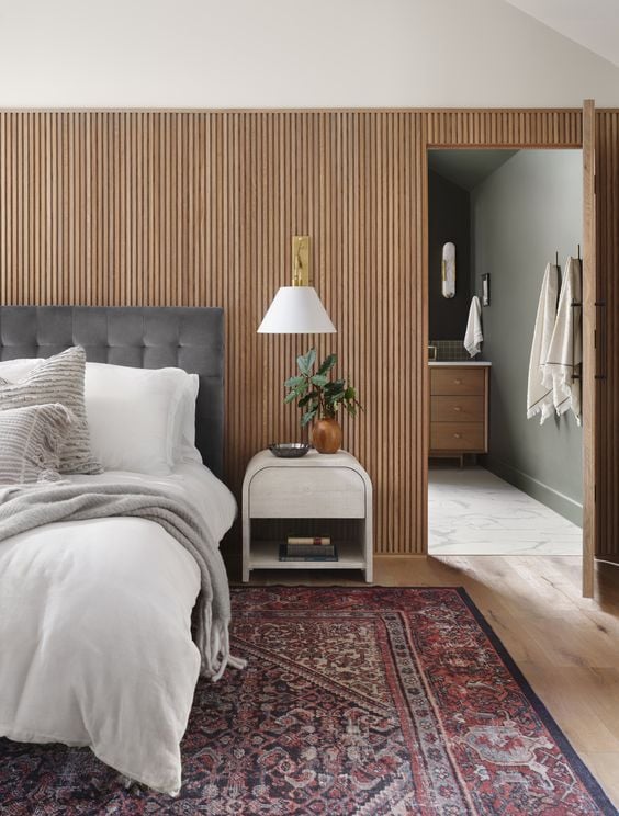 Best NEW bedrooms by Joanna Gaines from Fixer Upper; wood accent wall, gold scones, grey headboard