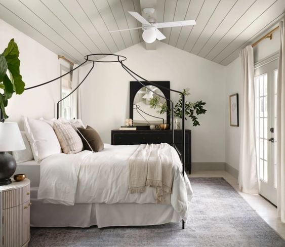 Best NEW bedrooms by Joanna Gaines from Fixer Upper; white bedroom, iron bed, shiplap