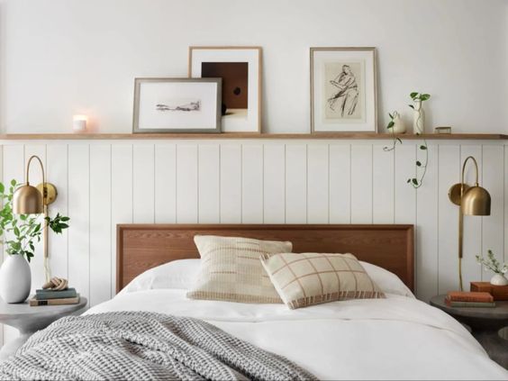 Best NEW bedrooms by Joanna Gaines from Fixer Upper; minimalist bedroom, gallery wall
