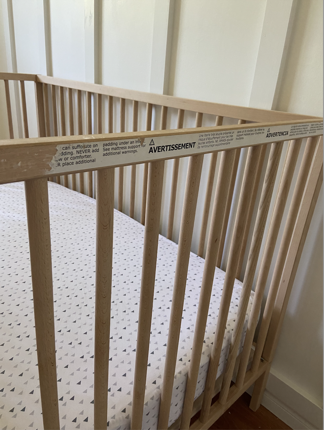 How to Remove the Warning Label off the Ikea Crib; simple tricks to remove the large sticker on the side of the SNIGLAR ikea crib