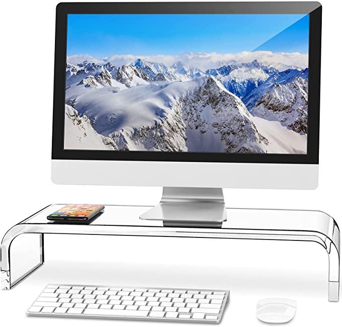 Acrylic Monitor Stand - 15 Pretty Home Office Must Haves to Boost Style and Productivity; When it comes to home office design, the right tools for the job are essential. Here are 15 pretty must have items to help you stay organized, productive and stylish.