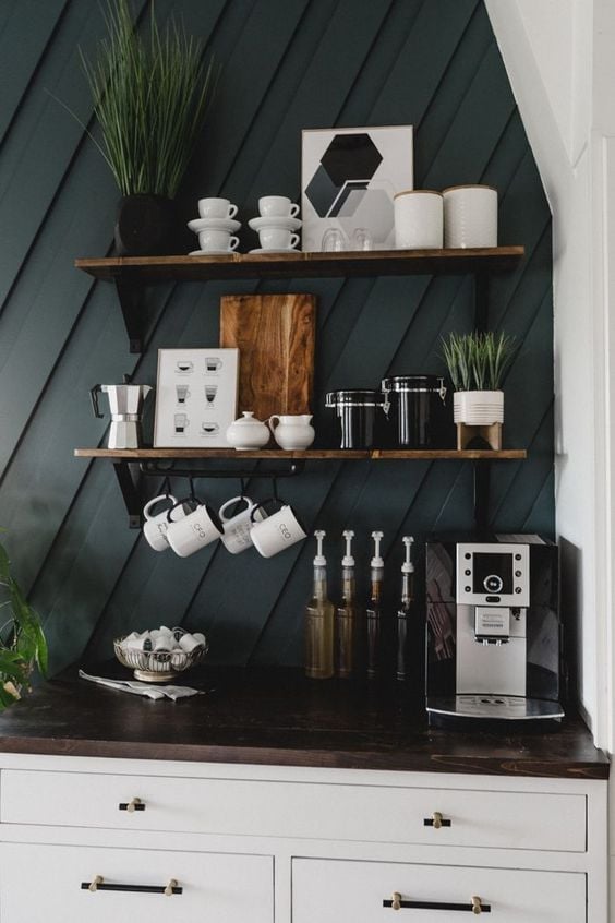 9 Home Coffee Bar Must Haves to Make You Feel Like a Real Barista; If you’re interested in making coffee drinks at home, here are basic home coffee bar must haves to help you get started. dark blue accent wall